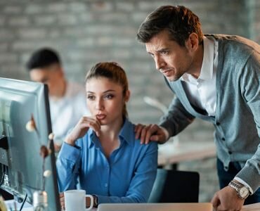 Two co workers collaborating on a project